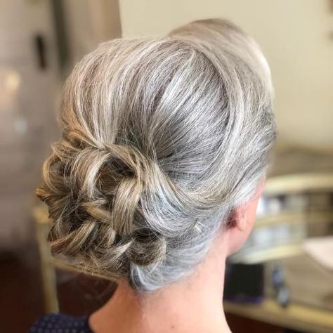 Fancy Updo for Salt-and-Pepper Hair Updo For Grey Hair, Hair Updos For Mother Of The Groom, Silver Hair Updo Wedding, Hair For Wedding Mother Of Groom, Updos For Gray Hair Over 50, Updo Hairstyles Mother Of The Bride, Gray Hair Updo, Silver Hair Updo, Mom Wedding Hair