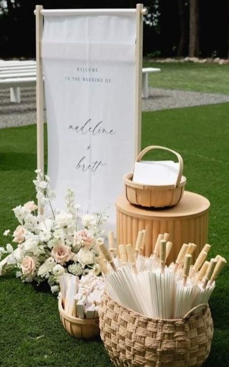 Ceremony Altar Decor Outdoor, Wedding Sun Umbrella, Wedding Welcome Sign Outdoor, Wedding Ceremony Outdoor Decorations, Beginning Of Aisle Wedding Decor, Wedding Parasols Ceremony, Petal Toss Station, Sun Umbrella Wedding, Wicker Basket Wedding Decor