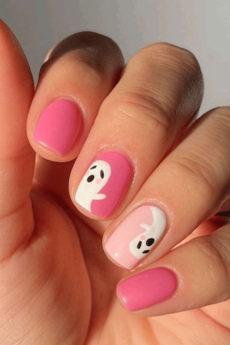 Halloween Nails with Pink, Spooky Yet Sweet Nail Ideas to Try This Season Pink Scream Halloween Nails, Hot Pink Halloween Nails, Nails With Ghosts, Halloween Almond Nails, Pink Halloween Nails, Nails With Pink, Holloween Nails, Halloween Acrylic, Black Ghost