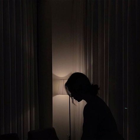 A female model standing in a dark bedroom lit only by a lamp. Dark Room Photography, Reka Bentuk Grafik, Boujee Aesthetic, Cover Wattpad, Haiwan Lucu, Grl Pwr, Buku Skrap, Shadow Pictures, Dark Pictures