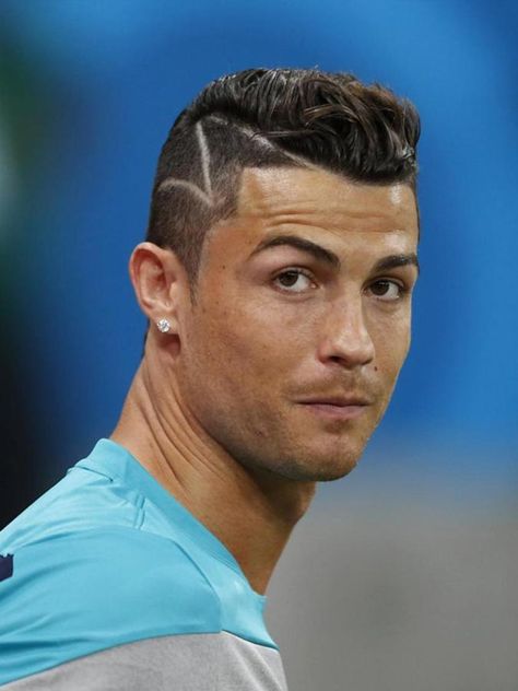 This Ronaldo-inspired haircut is a windswept undercut with a hard part. The hair on top looks like it’s eternally caught in a sudden gust of wind, while the hair on the sides is neat and tidy with a classic undercut. *** See the whole article at >>> http://haircutinspiration.com/soccer-haircuts Soccer Haircuts, Cr7 Lm10, Soccer Player Hairstyles, Ronaldo Hairstyle, Soccer Players Haircuts, Cristiano Ronaldo Haircut, Ronaldo Hair, Cristiano Ronaldo Hairstyle, Ronaldo Haircut