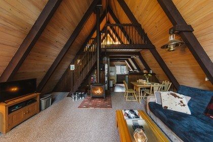 Coziest A-Frame Airbnb Cabins to Rent This Fall - Condé Nast Traveler Airbnb Cabins, A Frame Cabins, Bright Bathroom, Upstairs Loft, Appartement Design, A Frame Cabin, A Frame House, Indoor Fireplace, Gray Interior