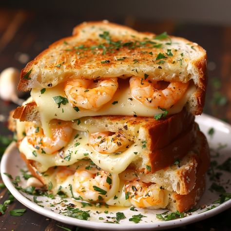 🧀🦐 Indulge in Cheesy Garlic Bread Shrimp Grilled Cheese for a decadent treat! 🧀🦐 #CheesyDelights #SeafoodLovers CHEESY GARLIC BREAD SHRIMP GRILLED CHEESE Ingredients: Shrimp (1/2 lb, peeled and deveined) Garlic (2 cloves, minced) Butter (1/4 cup, softened) Italian bread (8 slices) Mozzarella cheese (2 cups, shredded) Parmesan cheese (1/4 cup, grated) Parsley (1 tbsp, chopped) Olive oil (1 tbsp) Instructions: In a skillet, heat olive oil and sauté shrimp with garlic until pink. In a bowl, ... Sauté Shrimp, Twist Recipes, Shrimp Grilled, Shrimp With Garlic, Cheese Slice, Breaded Shrimp, Grilled Bread, Twisted Recipes, Cheesy Garlic Bread