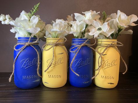 Royal Blue And Yellow Wedding Theme, Classroom Decor Christmas, Yellow Party Decorations, Facs Classroom, Blue And Yellow Wedding, Yellow Centerpieces, Banquet Centerpieces, Trunk Party, Backyard Graduation Party