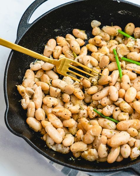 Make cannellini beans into a tasty side dish with this easy recipe! It's packed with Mediterranean flavor and plant-based protein. #cannellinibeans #cannellini #beans #beanrecipe #5minuterecipe #quickdinner #fast #easy #healthy Canned Cannellini Bean Recipes, Canalini Beans Recipe, Canalini Beans, Cannellini Bean Recipes, Cannellini Beans Recipes, White Bean Recipes, 5 Minute Meals, Cannellini Beans, Bean Recipes