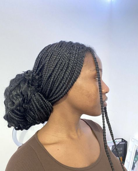 Braids Low Bun For Black Women, Box Braids In Low Bun, Braided Bun Aesthetic, Low Bun Box Braids Hairstyles, Low Bun On Braids, Low Braid Bun For Black Women, Low Bun Braids For Black Women, Low Bun Knotless Braids, Low Bun Hairstyles With Braids