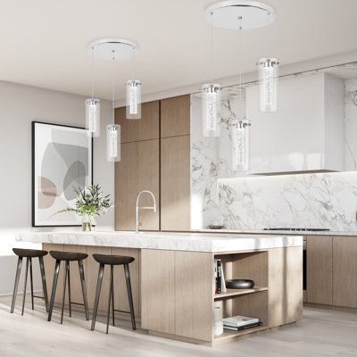 This 3 Lights Cluster LED Pendant light features a simple, modern appearance, highlighted by clear glass and crystal bubble cylinder. Transform your living spaces with this Contemporary fixture that enhances a variety of interior design themes. This refined hanging pendant features natural style inclusions on its inner shades, and they are each surrounded by a Clear Glass outer shade. Each mini-pendant comes with an adjustable cord that allows for custom height adjustability for each pendant. It Kitchen Island Light Wood, Modern Long Kitchen Island, Modern Light Kitchen Design, Black White And Neutral Kitchen, White And Light Wood Kitchen, White Oak Kitchen Cabinets Modern, Modern Kitchen White Cabinets, Kitchen Inspo Modern, Light Modern Kitchen