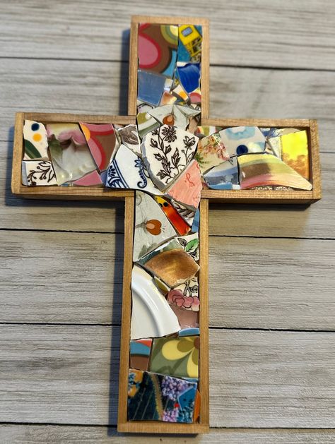 This cross will be perfect decor in your home as a sentiment to your faith. It makes a special and unique gift as well. A sweet reminder of what you stand for. Each piece was carefully placed by me and I enjoyed every minute making it. I collect beautiful dishes from all over and break them for my mosaics.  This style of mosaics is called Picassiette. A style of mosaic that incorporates broken dishes, ceramic shards, and other found objects to make a design. Broken China Mosaics, Mosaic Crosses, Broken China, Found Objects, Beautiful Dishes, Found Object, Mosaic Crafts, Mosaic Art, Wall Hangings