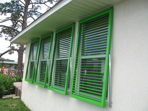 white-wall-plus-bahama-shutters-plus-greenery-for-exterior-design-bahama-shutter-hardware-diy-bahama-shutters-cheap-bahama-shutters-how-to-build-bah « STORM SHUTTER MECHANIC Colonial Shutters, Bermuda Shutters, California Shutters, Types Of Shutters, Bahama Shutters, Red Shutters, Outdoor Shutters, Window Protection, Different House Styles