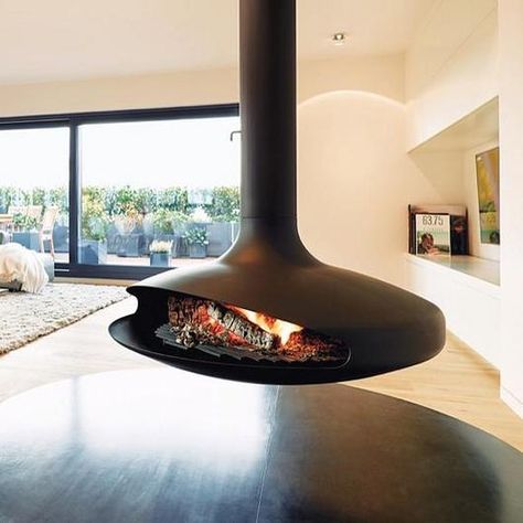 Fireplaces - Gyrofocus from Focus Gyrofocus Fireplace, Focus Fireplaces, Suspended Fireplace, Hanging Fireplace, Exterior Fireplace, Renewable Sources Of Energy, Fireplace Design, Design Case, Large Windows