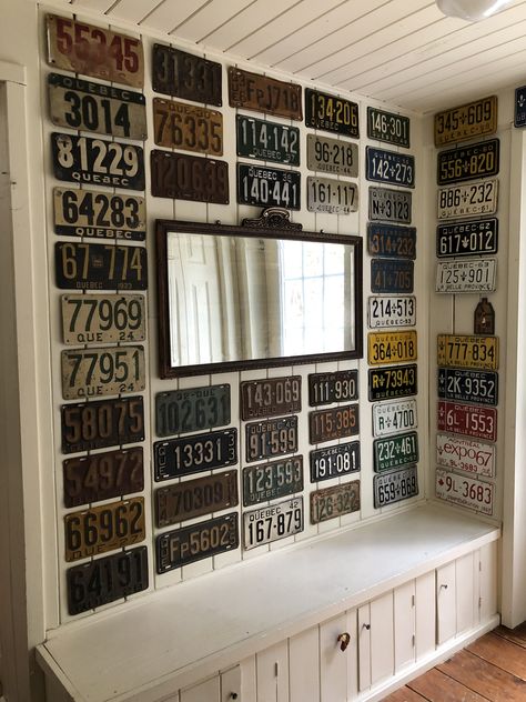 Old license plate display Antique License Plates Ideas, Display Old License Plates, License Plate Room Decor Aesthetic, Vintage License Plates Decor Wall Art, License Plate Wall Decor Ideas, License Plate On Wall, Display License Plates, Decorating With License Plates, License Plate Wall Art