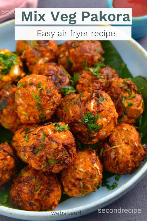 Discover the secret to creating scrumptious vegan and gluten-free Air Fryer Mix Veg Pakoras that will delight your taste buds. Our easy-to-follow recipe will have you mastering the art of mixed veg fritters in no time. Say goodbye to heavy, greasy fried food and hello to a healthier, tastier alternative! Follow us @secondrecipe for more interesting recipes. Veggie Party Food, Crispy Cabbage, Air Fryer Recipes Indian, Vegetable Pakora, Mix Vegetable, Mix Veg, Lentil Flour, Pakora Recipes, Air Fry Recipes