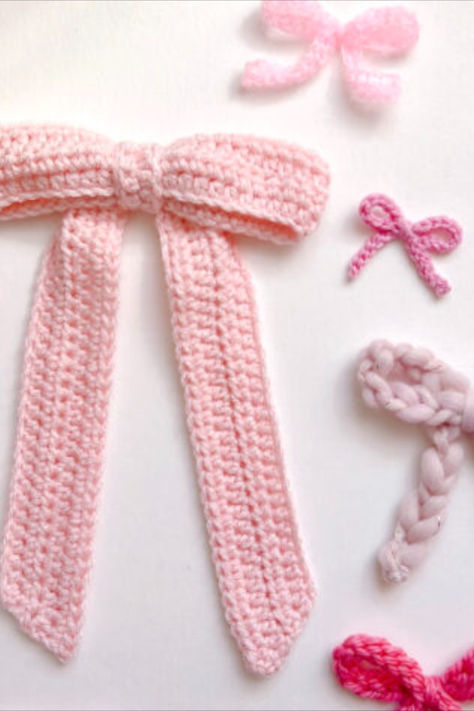 Think ballet, Bridgerton, and Barbie, all rolled into one. While you can make your coquette bows with ribbon, crocheting them will bring an even softer and dreamier feel. Designer Twinkie Chan gives you 4 easy and free crochet bow patterns and a few ideas on how to use them. Crochet Bow For Amigurumi, Free Crochet Patterns Websites, Easy Crochet Designs For Beginners, Ribbon Crochet Pattern Free, Crochet Bows Hair, How To Crochet A Ribbon, Knit Ideas For Beginners, Crochet Patterns Accessories, Free Crochet Bow Pattern