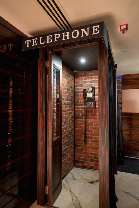 PDT HK would not have been complete without the phone booth at the entrance and… Speakeasy Hidden Door Ideas, Phone Booth Door, Speakeasy Door Entrance Diy, Cafe Entrance Door, Speak Easy Bar Entrance, Secret Speakeasy Entrance, Speak Easy Door Ideas, Speakeasy Entrance Doors, Speakeasy Bar Entrance