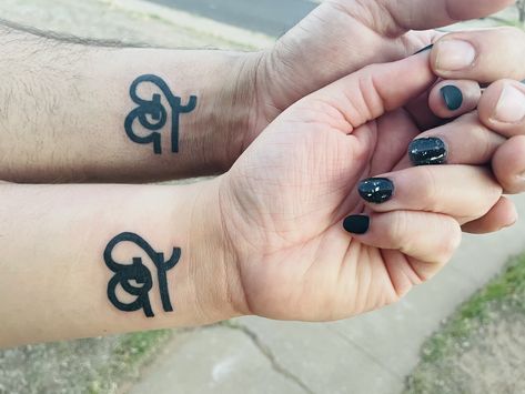 Cute Couples tattoo. Merged zodiac signs #Libra&Leo #2021 Libra Wolf Tattoo, Leo And Libra Tattoo Combined, Leo X Libra Couple, Libra Leo Tattoo, Libra And Leo Tattoo, Couples Zodiac Tattoos, Couple Wrist Tattoos, Artemis Tattoo, Sky Tattoos