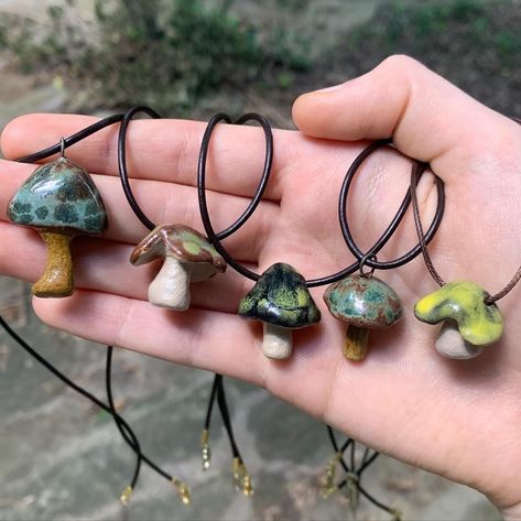 These mushroom necklaces feature handmade stoneware pendants. These unique and one of a kind necklaces are perfect for anyone who loves nature and earth tones. If you are trying to get away from mass produced, unoriginal jewelry that breaks in a year, these handmade necklaces are a perfect option. These necklaces are water resistant. Mushroom Clay Necklace, Mushroom Necklaces, Mushroom Stuff, Random Jewelry, Cottage Core Fairy, Mushroom Necklace, Diy Pendant Necklace, Earthy Jewelry, Illustration Pen And Ink