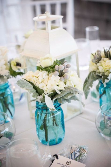 DIY Wedding Centerpieces -Rustic Blue Mason Jar Wedding Centerpiece - Do It Yourself Ideas for Brides and Best Centerpiece Ideas for Weddings - Step by Step Tutorials for Making Mason Jars, Rustic Crafts, Flowers, Modern Decor, Vintage and Cheap Ideas for Couples on A Budget Outdoor and Indoor Weddings #diyweddings #weddingcenterpieces #weddingdecorideas Blue Centerpieces For Party, Blue Mason Jar Centerpieces, Turquoise Party Decorations, Tiffany Blue Wedding Decorations, Babyshower Centerpieces, Turquoise Wedding Decorations, Wedding Centerpieces Diy Rustic, Quinceanera Bouquet, Bouquet Centerpiece