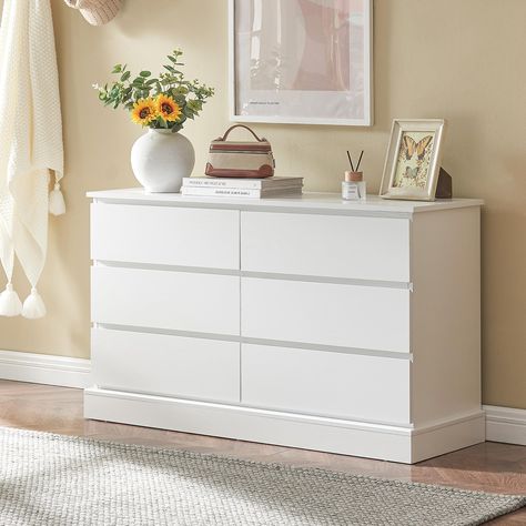 PRICES MAY VARY. Ample Storage Space: This white dresser has 6 drawers with overall dimensions of 15.75"D x 47.24"W x 27.56"H, and single drawer dimensions of 11.02"D x 21.23"W x 4.33"H, which can be categorized for storing a variety of clothes, dolls, books and other household items. The top layer of this 6 drawer dresser can also hold decorations and collectibles, such as green plants and small sculptures, enhancing the tidiness and cleanliness of your room Multi functional Chest of Drawers: T Room With White Dresser, Nightstand And Dresser Combo, Small White Dresser, White Dresser Bedroom, Dressers For Bedroom, Dresser Decor Bedroom, Dresser Organizer, Storage For Living Room, Wood Chest Of Drawers