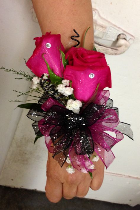 Hot Pink And Black Corsage Prom, Hot Pink Prom Flowers, Pink And Black Corsage, Hot Pink Wrist Corsage, Prom Corsage Pink, Cowboy Prom, Black Corsage, Prom Flowers Corsage, Corsage Ideas