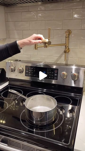 Lisa Sandham Interior Design on Instagram: "Sneak peak alert! Can you guess what’s cooking in this newly renovated kitchen? 🍝 Stay tuned for the big reveal!   Pot filler @faucetorsink   🎥 @dangarritymediacommercial   #kitchendesign #pasta #kitchenmusthaves #kitchenrenovation #homerenovation #interiordesign" Por Filler Kitchen, Kitchens With Pot Fillers, Pot Fillers Over Stove Placement, Pot Filler Placement, Pot Fillers Over Stove, Kitchen Facelift, Pot Filler Kitchen, Stove Backsplash, Renovated Kitchen