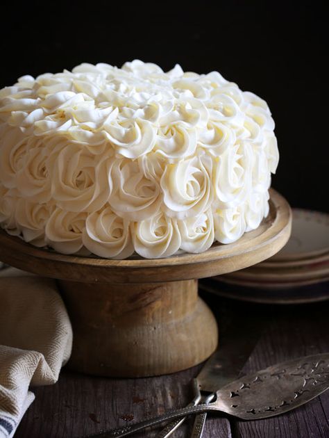 Stunning rosettes cover this flavorful cake... white cake layers complemented with rich fudgey brownie deliciousness! White Layer Cake, Surprise Inside Cake, Inside Cake, White Cake Recipe, I Am Baker, Cake White, White Cakes, Cake Layers, Buttercream Recipe