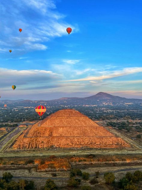 46210. Hot Air Balloon Flight over Teotihuacan, Mexico Check more at https://onemillionphotographs.com/2022/04/04/46210-hot-air-balloon-flight-over-teotihuacan-mexico/ Balloon Flights, One Million, Hot Air Balloon, Air Balloon, Hot Air, Flight, Balloons, Natural Landmarks, Travel