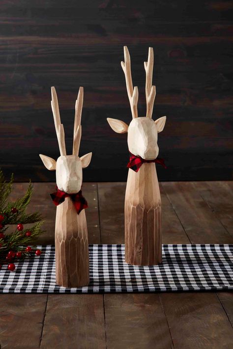 Create the coziest Christmas environment with our Small Decorative Deer Sitter. The carved wooden deer sitter features bark-like texture. The deer sitter features the most unique details and the reindeer is wearing a cotton bow. Make sure to pair with our other decorative deer sitters for a matching set. | Mud Pie Small Decorative Deer Sitter in Brown | Pine Wood Christmas Environment, Wooden Deer, Simple Wood Carving, Deer Ornament, Wood Stars, Wood Christmas Ornaments, Plaid Bow, Christmas Wood, Mud Pie