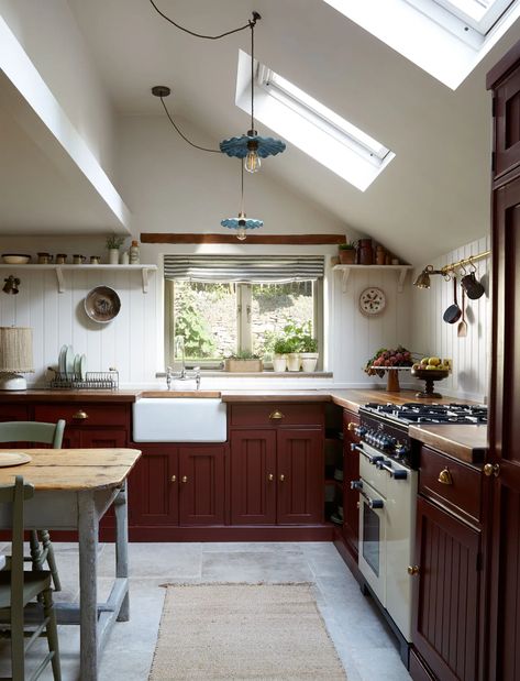 A Cotswold cottage that is almost too charming to be real | House & Garden Cotswold House, Cotswold Cottage, Narrow Staircase, Cotswolds Cottage, Instagram Kitchen, Modern Country Style, Colour Colour, Classic Kitchen, Red Kitchen