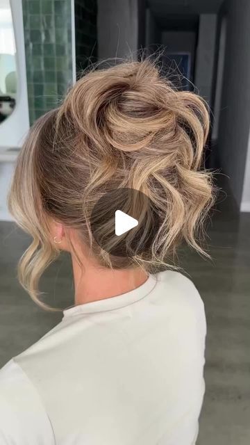 Salons Direct on Instagram: "YOUR HAIR UP INSPO ⚡⁣ ⁣ Watch as the talented @chantellemareehair shows you how to create this effortless, soft high bun on your clients. ⁣ ⁣ She uses the ghd Helios and Soft Curl Tong to prep the hair, available at salonsdirect.com 🙌⁣ ⁣ Don't forget to press the SAVE button & recreate this look for your clients next night out 💎⁣ --⁣ ⁣ #salonsdirect #hairup #updo #updohairstyle #ghd #ghdhelios #ghdsoftcurltong #hairupdo #hairtutorial #hairtutorials #hairstyletutorials" Hairdo Updo Messy, How To Messy Updo Long Hair, Formal Buns For Long Hair, Messy Hair Updo Short Hair, Bun Wedding Hairstyles High, High Messy Bun Updo Wedding, Effortless Updo Wedding, High Hair Updos Wedding, How To Do Messy High Bun