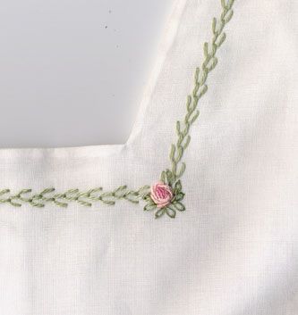 Green featherstitch outlines square yoke of batiste sundress. Pink bullion roses accent the corners. Made by Trudy Horne: Simple Hand Embroidery Designs, Bullion Rose, Diy Broderie, Diy Embroidery Patterns, Handmade Embroidery Designs, Embroidery Stitches Tutorial, Baby Embroidery, Hand Embroidery Flowers, Embroidery Flowers Pattern