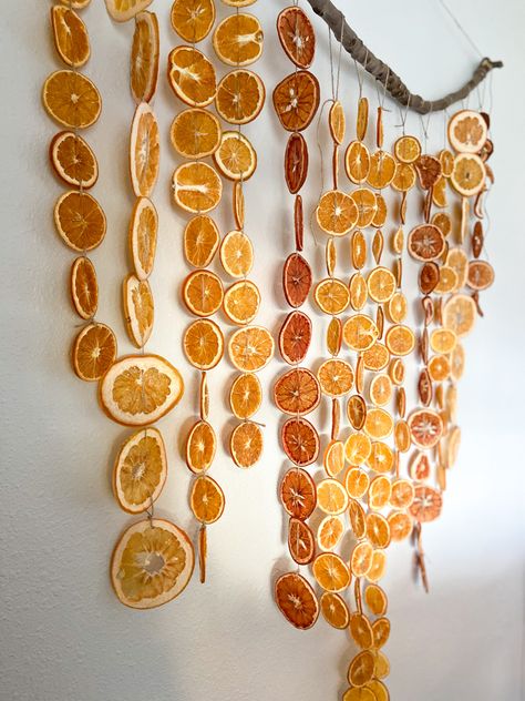 #babyshowerideas #babyshowerthemes #garland #DIYgarland #citrusgarland #diy #christmasdiy #diybanner #citrustheme #fruit #fruitgarland #scandinavian #homedecor #nursery #nurserytheme Died Orange Slices Garland, Dehydrated Citrus Decorations, Dried Orange Backdrop, Fall Room Decor Aesthetic Diy, Orange Peel Mushroom Garland, Dehydrated Fruit Garland, Dehydrated Fruit Decor, Fruit Themed Room, Fruit Garland Diy