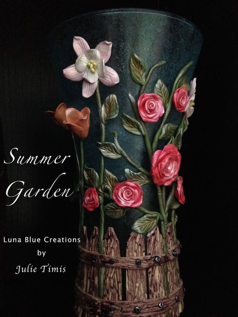 received the most "clicks" on the #GreatBlogTrain blog hop! : http://www.lunabluecreations.blogspot.ca/2015/01/summer-garden-polymer-clay-frosted-vase.html Clay Art On Pot, Bottle Crafts With Clay, Upcycled Vase, Big Wine Glass, Clay Vases, Glass Art Pictures, Wine Wall Art, Wine Glass Art, Glass Bottles Art