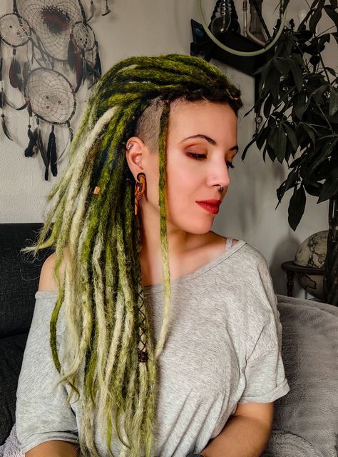 #greenhair #greendreads #dreads #dreadlocks #girlwithdreads #forest #nature #witchy #greenwitch #alternative #dreadstyle #hairstyle Womens Haircut Shaved Sides, Viking Dreadlocks Hairstyles, Curly Hair Dreadlocks, Dread Dye Ideas, Dreadlock Aesthetic, Short Dreads Styles, Dreadlocks Short Hair, Undercut Dreadlocks, Dreadlocks Aesthetic