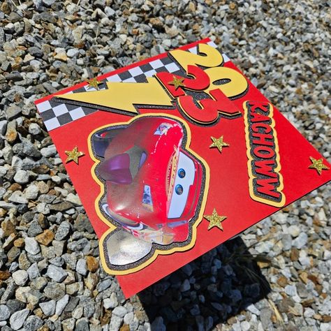 Cars theme graduation cap Transformers Graduation Cap, Graduation Cap Designs Lightning Mcqueen, Cars Themed Graduation Cap, Car Themed Graduation Cap, Lightning Mcqueen Grad Cap, Curious George Graduation Cap, Lighting Mcqueen Graduation Cap, Mechanic Graduation Cap Ideas, Pixar Graduation Cap