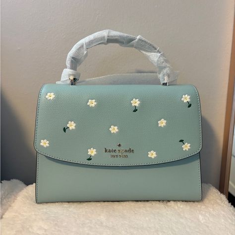 Kate Spade Top Handle, Embroidered. Brand New. Smoke Free; Pet Friendly Home. 7.13"H X 9.63"W X 3.5"D (Bottom) 7.13"H X 9.63"W X 2"D (Top) Handle Drop: 2.88" Strap Drop: 22" Refined Grain Leather Metal Pinmount Logo Two Way Spade Jacquard Lining Interior: Front & Back Zip Pocket Exterior: Back Slip Pocket Flap With Magnetic Snap Closure Kate Spade Style, Girly Bags, Pretty Bags, Kate Spade Purse, Cute Purses, Satchel Purse, Kate Spade Handbags, Cute Bags, Medium Bags