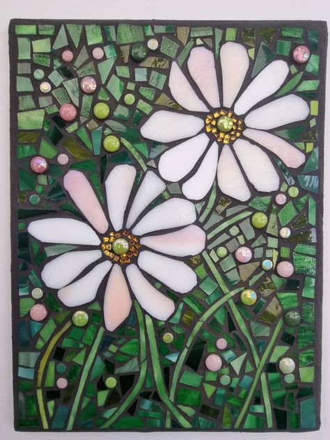 A stained glass mosaic wall plaque of white japanese anemones with a hint of pink on a green background. I love these flowers, they are nostalgic for me as we had them in our garden as a child. They bring back so many memories. This mosaic comes with a D ring and picture cord for hanging. For indoor use only. Though every effort has been made to avoid it some sharp edges may remain so take care when handling or cleaning with a damp cloth. Japanese Anemones, Mosaic Tiles Crafts, Mosaic Art Diy, Mosaic Flower Pots, Green Mosaic, Mosaic Garden Art, Floral Mosaic, Mosaic Art Projects, Mosaic Stained