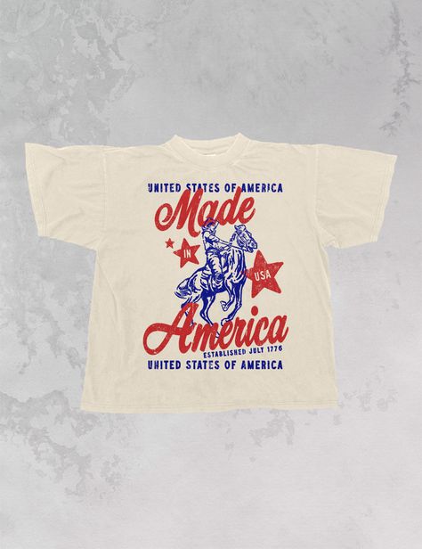 Show off that you're Made in America in our retro USA oversized t-shirt - Features "Made in America" with a man riding a horse and "Unites States of America" above and below all in red and blue ink - Screen Print transfer that is heat pressed onto each tshirt - Tshirt is a super soft vintage wash that gets softer after each wash - Oversized fit - Sizing translation: XS/S = L , S/M = XL , L/XL = 2XL , 2XL/3XL = 3XL - 100% Cotton **due to screens & filters color may vary from pictures** Country Concert Tshirts, Tshirt Screen Printing Ideas, Vintage Tshirt Design Ideas, Vintage Usa Shirt, Conference Tshirt Design, Screen Print Tshirt Design, Usa T Shirt Design, Cute Graphic Tees Aesthetic, Vintage Sports Tees