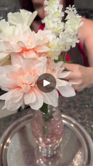 463K views · 566 reactions | Easy DIY Flower Arrangement 🌸

🎬 This video was produced by Network Media and Kyle & Mistie Knight | By Storytime | Clear glue and you want it to
bubble up like that just about marbles or stones You can see
I've got glitter on the bottom there. Ain't that beautiful?
You want those bubbles in there and they'll actually dry and
the cool thing is is that these stones will make the glue rise
and you just fill the bottle My aim isn't the best but look at
how pretty that is and then, you're going to take some
artificial flower Choose the one that's going to be the
centerpiece of your flower design and it's going to go
right in the middle. And see these stones will hold it in
place. I really like the addition of the glitter though
because it just picks up the light. Glazed Icing Recipe, Diy Flower Arrangement, Glaze Icing, Bubble Up, Clear Glue, Flower Arrangements Diy, Kindle Case, Icing Recipe, Diy Videos