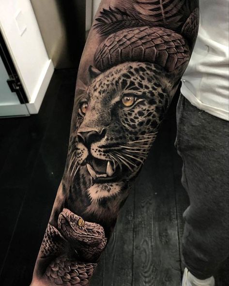 For similar reasons, the Leopard is also known to symbolize power and skills. When it comes to instincts nothing can beat the way that a Leopard can adapt and manipulate situations to work for their favor. Because of this, Leopards are also the symbol for cunningness and capability! #tattoo #tattoodesign #tattooing #leopard tattoos # tattoo ideas # modern leopard tattoos # inspirational leopard tattoo ideas # tattoo for animal lover # tattoo for men # tattoo for women # tattoo on shoulder Tattoo Leopard, Animal Tattoos For Men, Jungle Tattoo, Big Cat Tattoo, Jaguar Tattoo, Animal Sleeve Tattoo, Leopard Tattoos, Aztec Tattoo Designs, Panther Tattoo