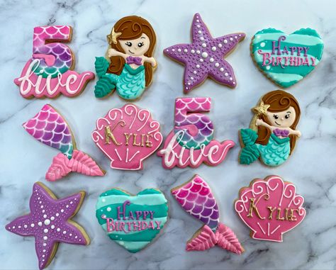 Mermaid sugar cookies decorated with royal icing Mermaid Sugar Cookies Royal Icing, Mermaid Cookies Decorated, Mermaid Birthday Cookies, Mermaid Sugar Cookies, Cookies Decorated With Royal Icing, Mermaid Cookies, Flooding Cookies, Decorator Frosting, Sugar Cookie Royal Icing