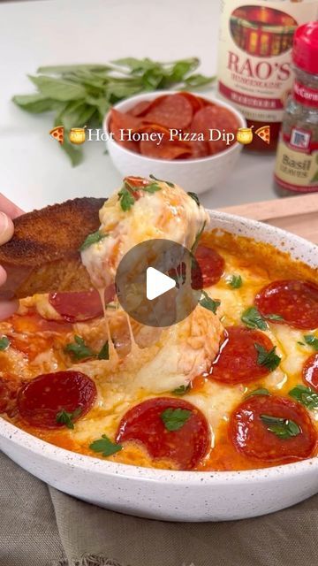 Rachaell Rampini on Instagram: "🍯Pizza dip with hot honey and pepperoni🍕I have been seeing pizza dip ALL over my feed. I don’t know who originally created the idea for this delicious dip, but oh my goodness. It is a great appetizer to bring to any gathering. Best part is you can prepare it ahead of time and pop it in the oven when you’re ready!

Pizza Dip with Pepperoni and Hot Honey
*full recipe can be found on my blog as well❤️🍕

8 oz cream cheese, room temp
1 cup sour cream, room temp
Sliced pepperoni (amount depends on size/shape of baking dish)
1 tsp dried basil
1/2 tsp dried oregano
1/2 tsp onion powder
1/2 tsp garlic powder
1 cup marinara
1 cup shredded mozzarella
1/4 cup grated Parmesan
1 tbsp hot honey
Parsley or basil to garnish (parsley stays fresh longer)

Preheat oven to 35 Pepperoni Pizza Dip, Crock Pot Dips, Pizza Dip, Cream Room, Chicken Pot Pie Soup, Dried Basil, Hot Honey, Great Appetizers, Yummy Dips