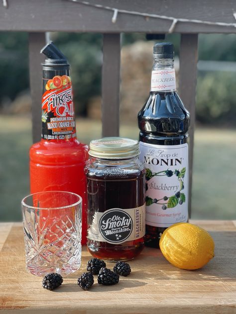 Disney Moonshine Sour Recipe, Epcot Moonshine Sour Recipe, Blackberry Moonshine Recipe Cocktails, Blackberry Sour Drink, Moonshine Sour Disney Recipe, Blackberry Moonshine Cocktails, Blackberry Moonshine Recipe, Ole Smoky Moonshine Recipes, Moonshine Martini