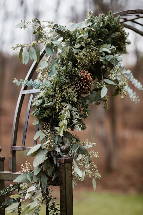 Evergreen Arch Wedding, Wedding Arch Ideas Winter, Evergreen Garland Wedding Arch, Forest Wedding Arches, Eucalyptus And Evergreen Wedding, Winter Flower Arch Wedding, Christmas Wedding Arbor Ideas, December Wedding Arch, Boho Chic Winter Wedding