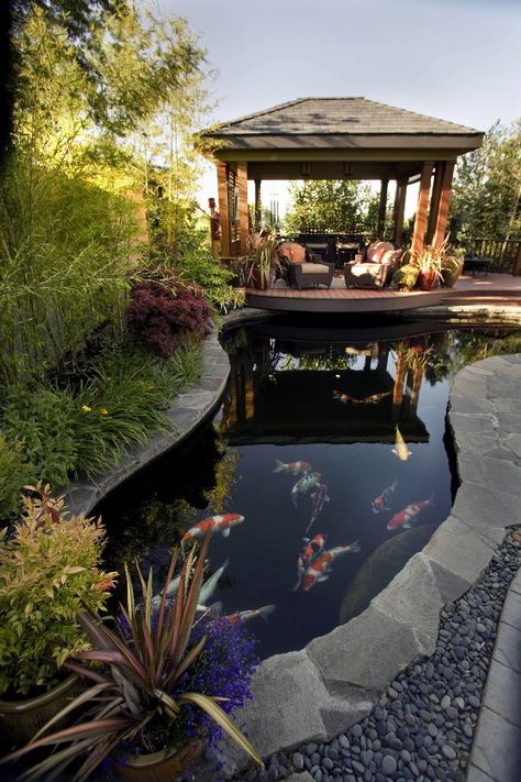 I like that the side of the gazebo facing the water has no walls. You could just dangle your feet. Koi Pond Design, Taman Diy, Fish Pond Gardens, Kolam Koi, Garden Pond Design, Jardim Diy, Small Pond, Pond Ideas, Pond Water Features