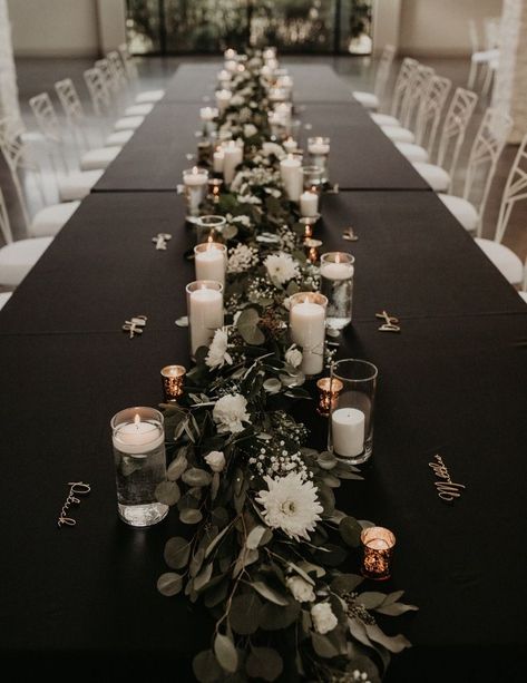 Long Black Table Wedding, Table Decorations With Black Tablecloths, Black Table With White Flowers, Flowers Laid On Table Wedding, Black Table Centerpieces Wedding, Reception Table With Candles, Table Set Up For Bachelorette Party, Black Wedding Tables Ideas, Black Wedding Table Linens