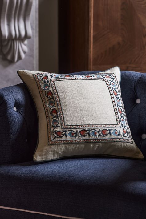 A layer of luxury for your living space, this Suzani cushion uplifts any setting. Crafted with an intricately embroidered floral design, this stunning piece is inspired by antique textile methods which  hail from Uzbekistan. Made from premium cotton slub, the gorgeous hues add a timeless and serene  feel to your space. Main 100% Cotton. Lining 100% Polyester. Blue Hallway Ideas, Manor Entrance, Embroidery On Pillow, Bed Setting, Cushion Arrangement, Product Styling, Nina Campbell, College Room, Borders Design