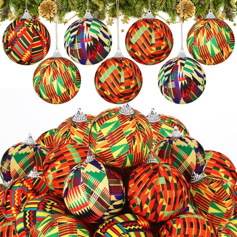 PRICES MAY VARY. African Print Design: our African Christmas ball ornaments: items feature representative traditional African print fabric patterns that are incredibly classic and attractive; The colors are bright, adding ideal and charming elements to your Christmas tree, breaking away from monotony Quality and Durability: our Kente Christmas ball ornaments are meticulously crafted, synonymous with; They are beautifully handmade, excellently made, and highly durable; Their sturdy, shatter resis African Christmas Decor, Fabric Covered Ornaments, Black Christmas Tree Ornaments, African Christmas Tree, African Christmas Decorations, Mexican Christmas Tree, Xmas Bulbs, African Christmas, Black Christmas Tree