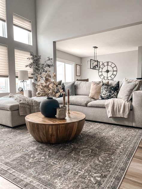 Neutral Toned Living Room, Grey Couch Living Room Aesthetic, Grey Rug Grey Couch Living Room, Beige Gray Couch Living Room, Dark Living Room Rugs With Grey Couch, Cozy Neutral Living Room Grey Couch, Gray Couch Modern Living Room, Styling Grey Sectional, Organic Modern Decor Grey Couch