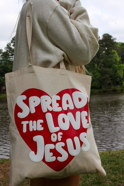 NEW! Spread Love Bundle — Child of God Co. Jesus Tote Bag, Bible Tote Bag, Christian Accessories, Jesus Clothes, Christian Tote Bags, Bible Bag, Christian Shirts Designs, Painted Tote, Love Canvas