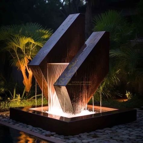 geometric fountain,metal fountain sculpture,outdoor fountain sculpture,outdoor fountain,garden fountain,garden fountain sculpture,geometric sculpture,modern fountain,modern outdoor fountain,fountain sculpture Modern Outdoor Fountain Ideas, Waterfall Landscape Design, Modern Fountains Outdoor, Outdoor Entrance Ideas, Pool Statues, Front Yard Fountain Ideas, Pool Waterfall Landscaping, Contemporary Fountain, Garden Art Sculptures Statues